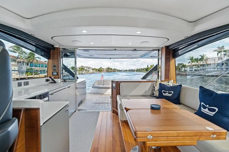 Slide: The Image of Luxurious interior of 2021 Princess V55 yacht with elegant seating and scenic water view. - 26