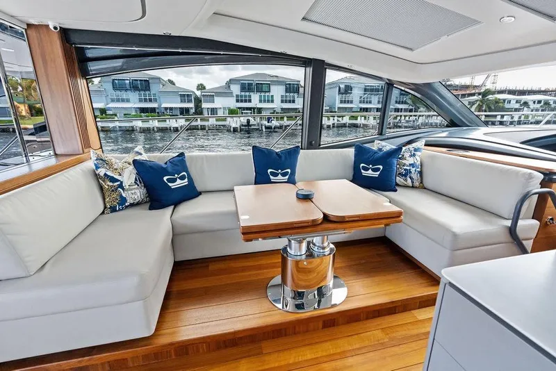 Slide: The Image of Luxurious interior of 2021 Princess V55 yacht with elegant seating and scenic view. - 27