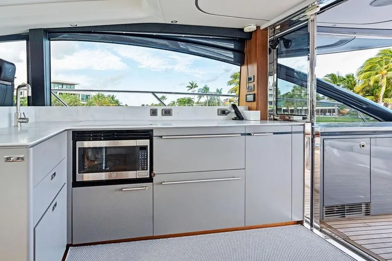 Slide: The Image of Modern kitchen interior on 2021 Princess V55 yacht with sleek cabinetry and appliances. - 31