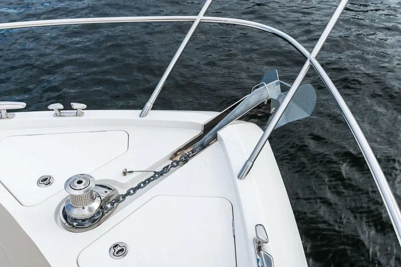 Slide: The Image of Bow of 2021 Princess V55 yacht with anchor and winch system. - 49