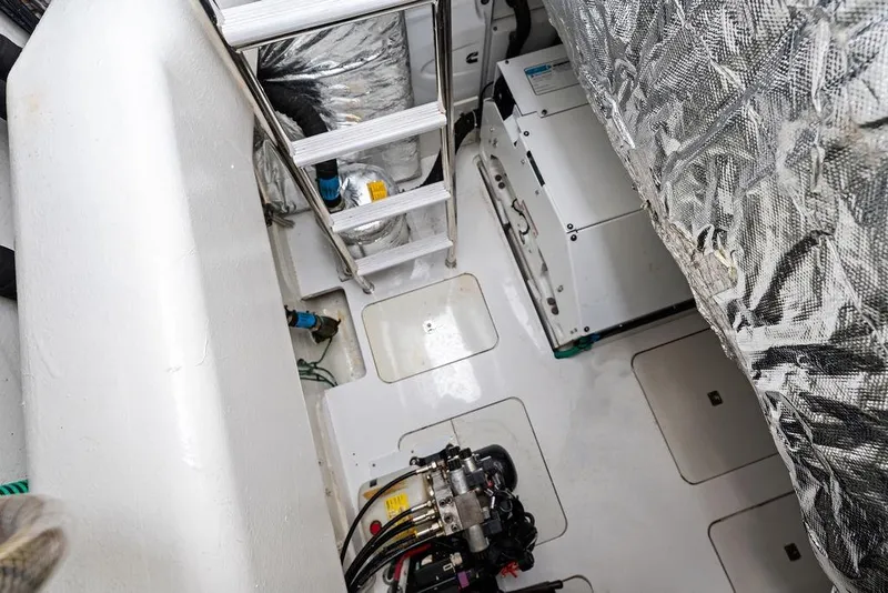 Slide: The Image of Engine room of 2021 Princess V55 yacht with ladder and equipment. - 57