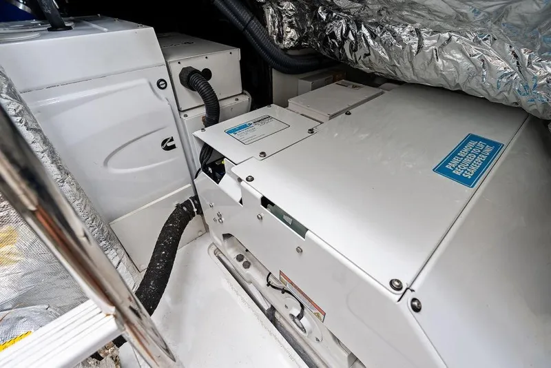 Slide: The Image of Engine room of 2021 Princess V55 yacht with mechanical equipment and insulation. - 58