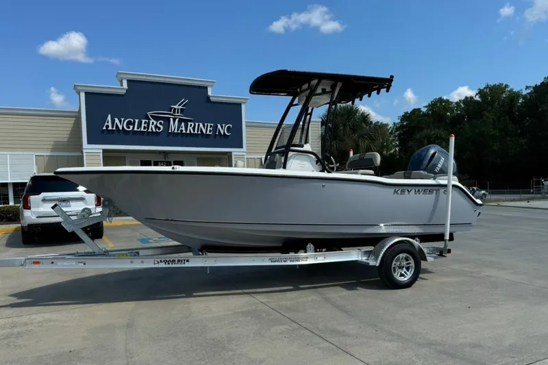The Image of 2025 Key West 203 FS boat on trailer at Anglers Marine NC dealership. - 1