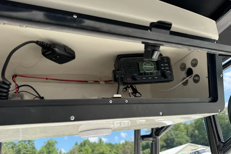 Slide: The Image of 2025 Key West 203 FS boat console with Garmin marine radio and wiring. - 17