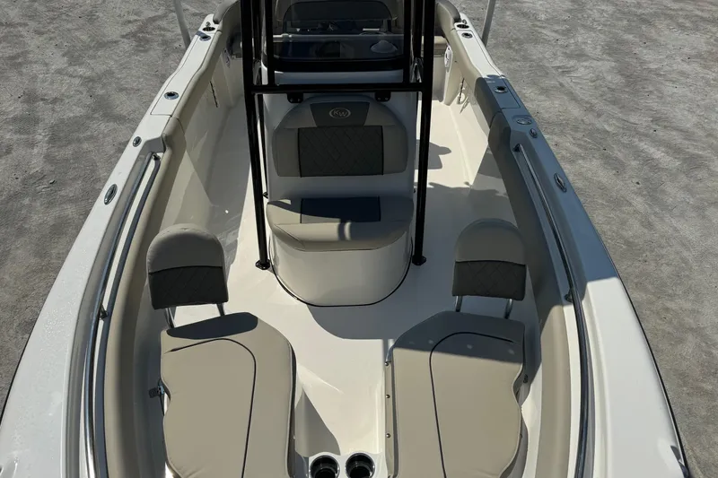 Slide: The Image of 2025 Key West 203 FS boat interior with seating and console, viewed from above. - 6