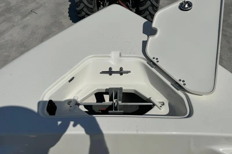 Slide: The Image of Open storage compartment on 2025 Key West 203 FS boat, showing interior details. - 7