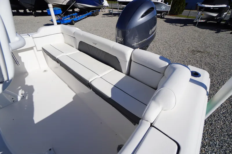 Slide: The Image of 2018 Tidewater 210 LXF boat interior with seating and Yamaha engine. - 31