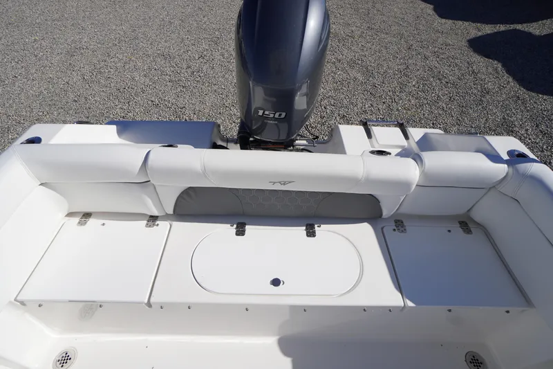 Slide: The Image of 2018 Tidewater 210 LXF boat with 150 HP engine, rear seating view. - 32