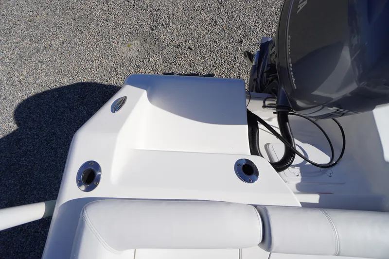 Slide: The Image of 2018 Tidewater 210 LXF boat deck with motor and seating detail. - 42
