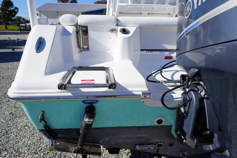 Slide: The Image of 2018 Tidewater 210 LXF boat stern with ladder and Yamaha engine. - 46