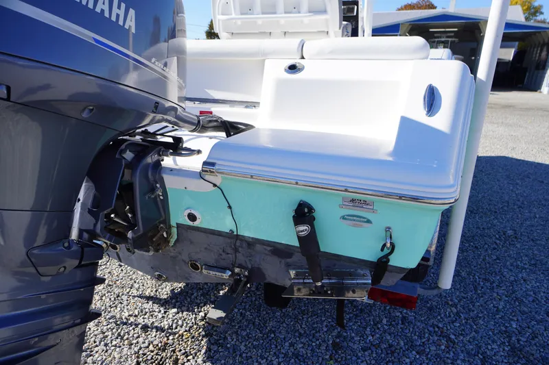 Slide: The Image of 2018 Tidewater 210 LXF boat with Yamaha outboard motor, displayed on gravel. - 48