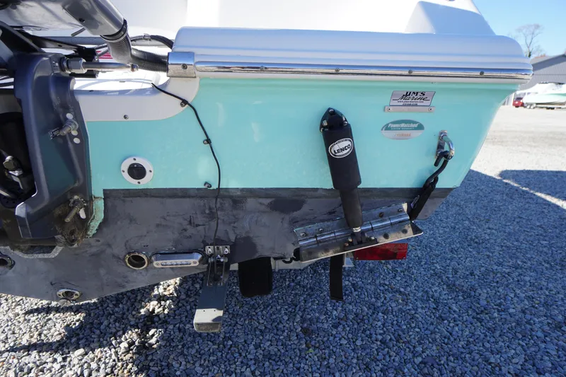Slide: The Image of 2018 Tidewater 210 LXF boat stern with Lenco trim tabs and Yamaha components. - 49