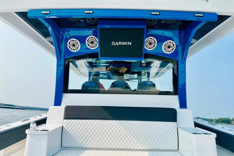 Slide: The Image of 2025 HCB 48 Campeon boat interior with Garmin display and speakers. - 21