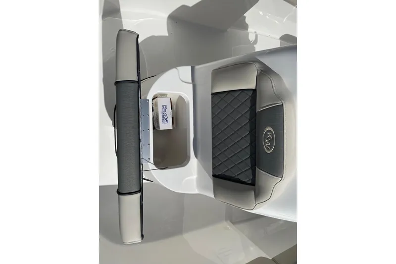 Slide: The Image of 2026 Key West 203 FS boat seat with quilted design and KW logo. - 18