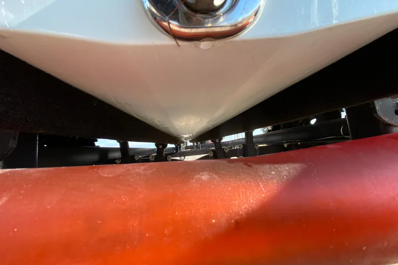 Slide: The Image of 2024 East Cape EVO 18V boat hull close-up on trailer. - 13