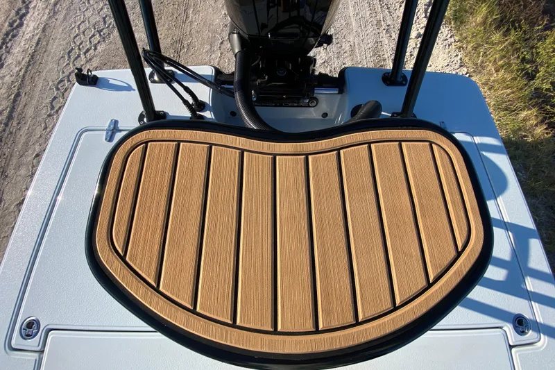 Slide: The Image of 2024 East Cape EVO 18V boat deck with teak-style matting, showcasing sleek design. - 62