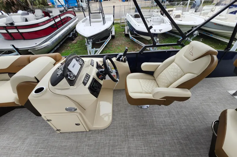 Slide: The Image of 2026 Lowe SF 212 Sport Fish boat interior with luxurious seating and modern dashboard. - 20