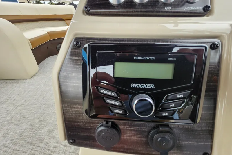 Slide: The Image of 2026 Lowe SF 212 Sport Fish boat dashboard with Kicker media center. - 26