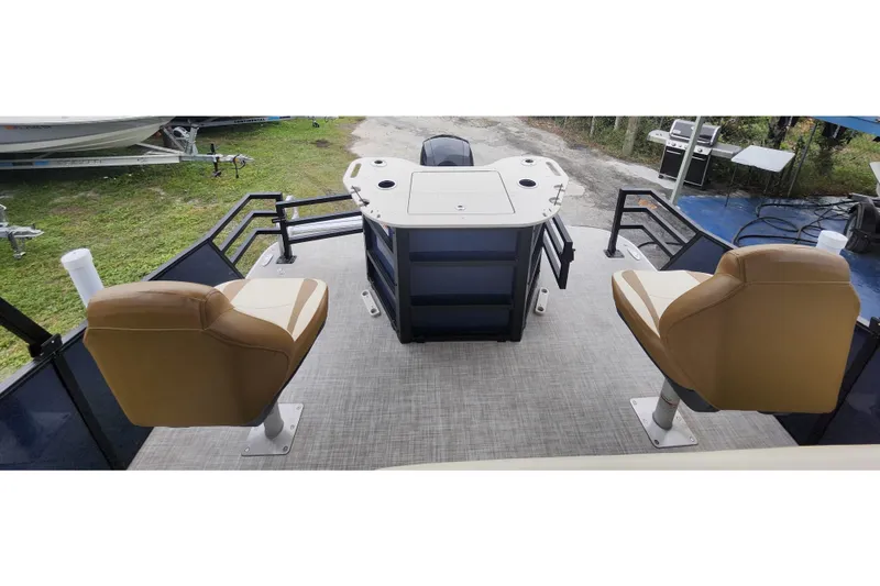 Slide: The Image of 2026 Lowe SF 212 Sport Fish boat interior with seating and fishing station. - 37