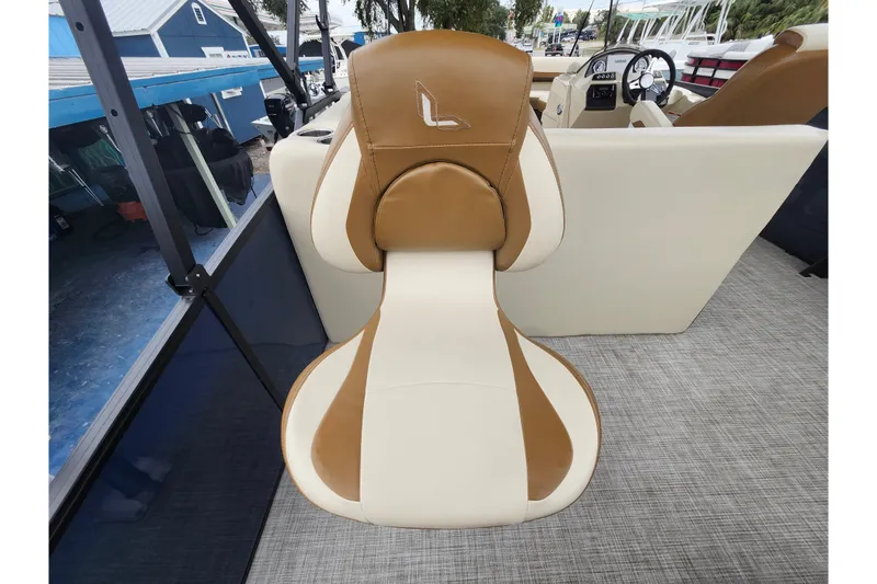 Slide: The Image of 2026 Lowe SF 212 Sport Fish boat seat, tan and cream upholstery, modern design. - 38