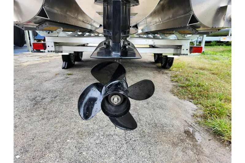 Slide: The Image of Propeller of 2026 Lowe SF 212 Sport Fish boat on trailer, close-up view. - 40