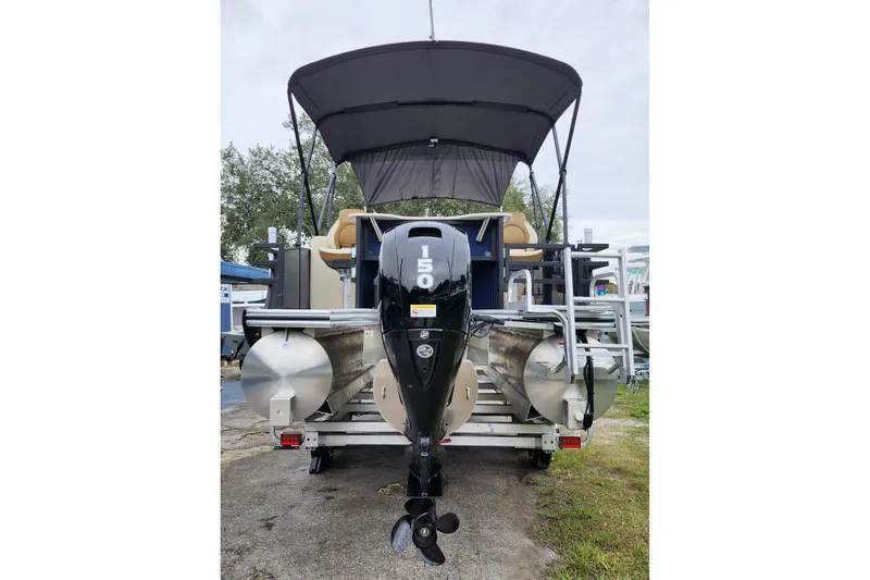 Slide: The Image of 2026 Lowe SF 212 Sport Fish pontoon boat with outboard motor and canopy. - 5