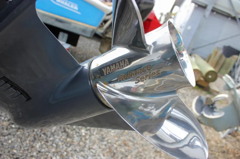 Slide: The Image of Close-up of Yamaha Reliance Series propeller on 2026 Sea Hunt Ultra 219 boat. - 11