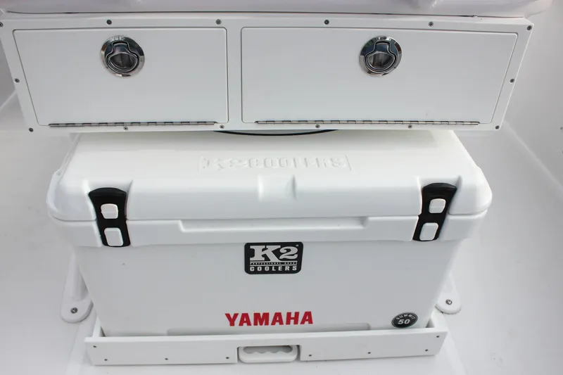 Slide: The Image of 2026 Sea Hunt Ultra 219 boat with K2 cooler and Yamaha branding. - 30