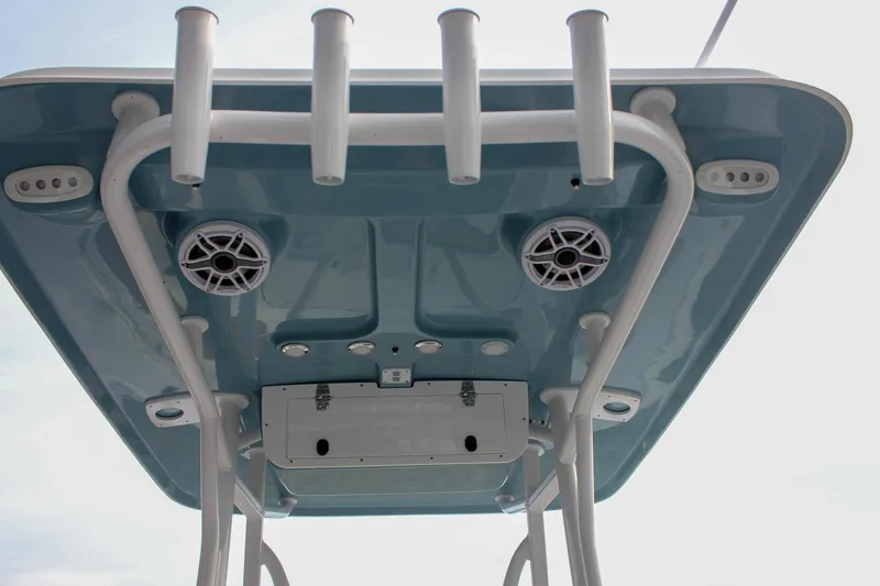 Slide: The Image of T-top view of 2026 Sea Hunt Ultra 219 boat with rod holders and speakers. - 33