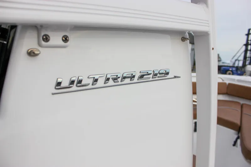 Slide: The Image of 2026 Sea Hunt Ultra 219 boat logo on white surface, showcasing sleek design. - 42