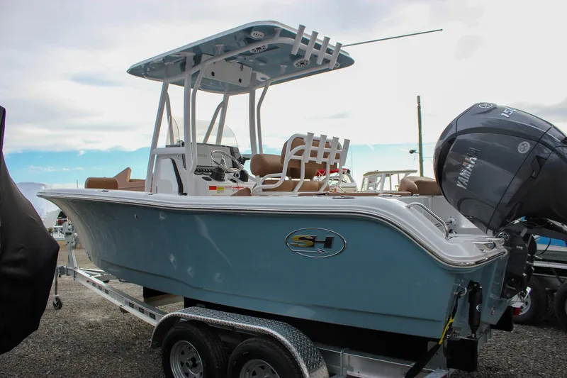 Slide: The Image of 2026 Sea Hunt Ultra 219 boat with Yamaha engine on trailer, side view. - 45