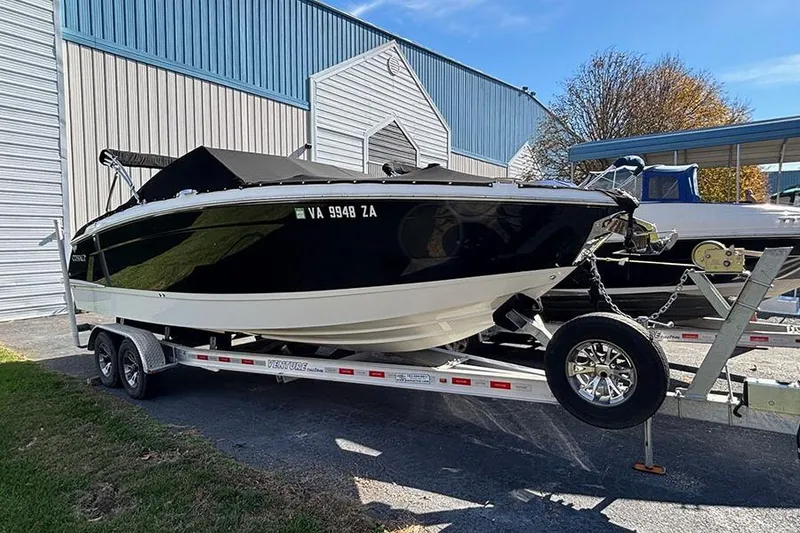 The Image of 2021 Cobalt R6 boat on trailer, parked outside a storage facility. - 0