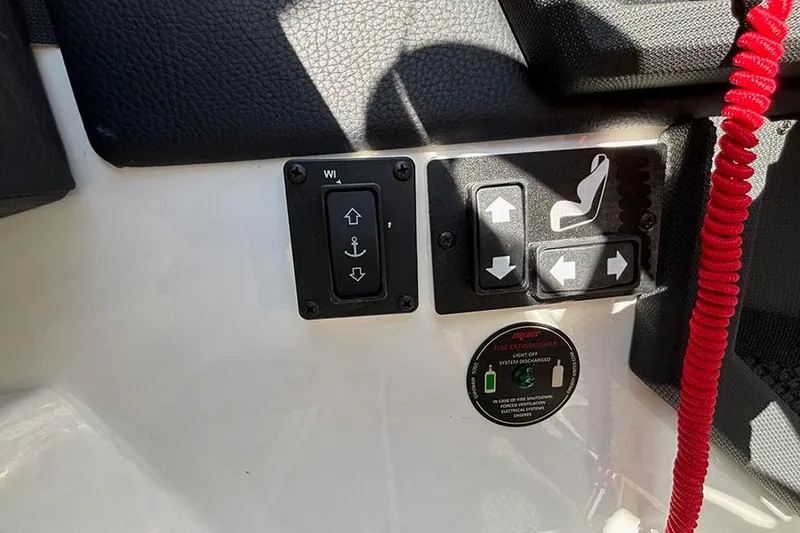 Slide: The Image of Control panel of a 2021 Cobalt R6 boat with seat and anchor switches. - 20