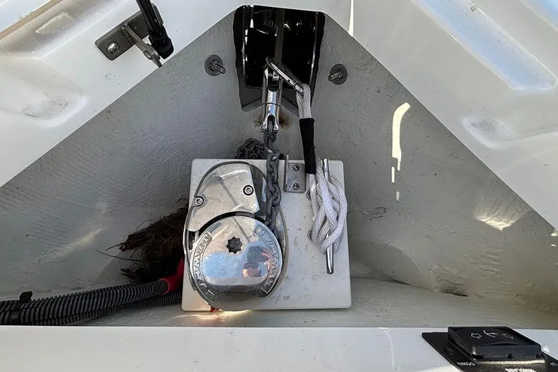 Slide: The Image of Anchor compartment of 2021 Cobalt R6 boat with winch and chain. - 22