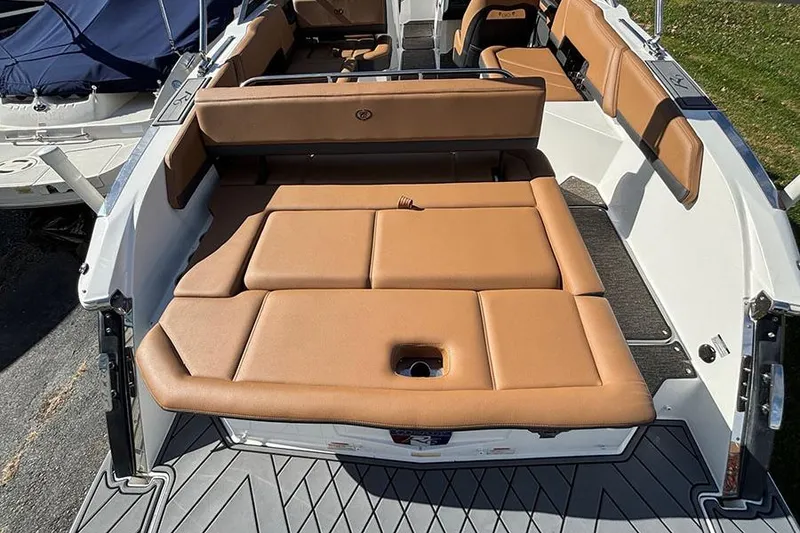 Slide: The Image of 2021 Cobalt R6 boat with tan leather seating and spacious deck layout. - 5