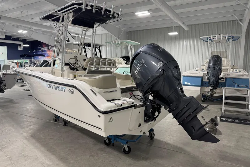 Slide: The Image of 2026 Key West 203 FS boat with Yamaha outboard motor in showroom. - 3