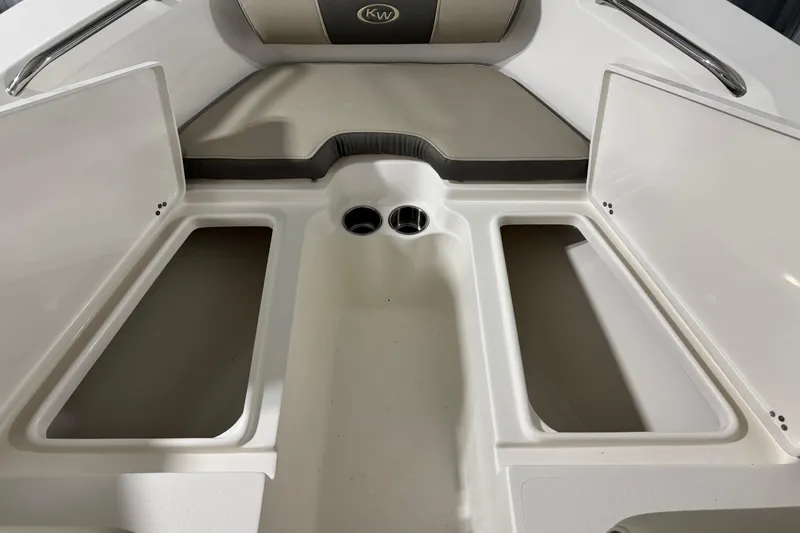 Slide: The Image of Interior view of 2026 Key West 203 DFS boat, featuring storage compartments and seating area. - 7