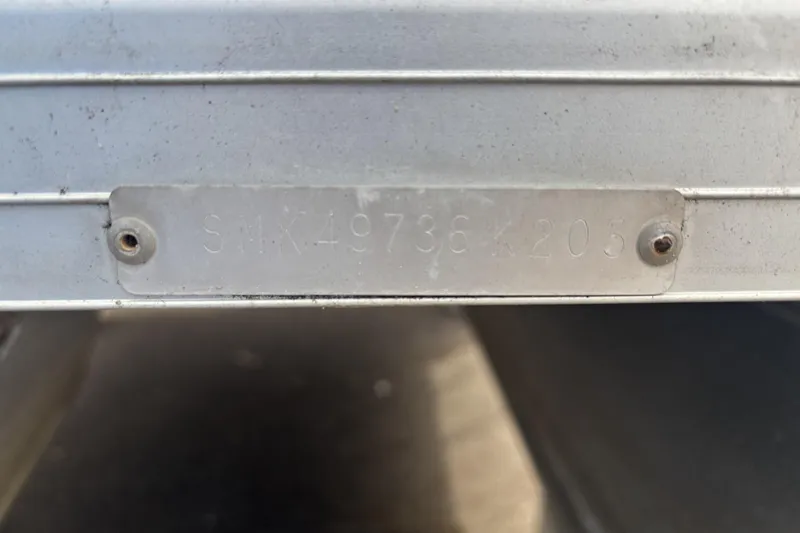 Slide: The Image of 2003 Smoker Craft 816 Infinity Fish boat identification plate with serial number. - 15