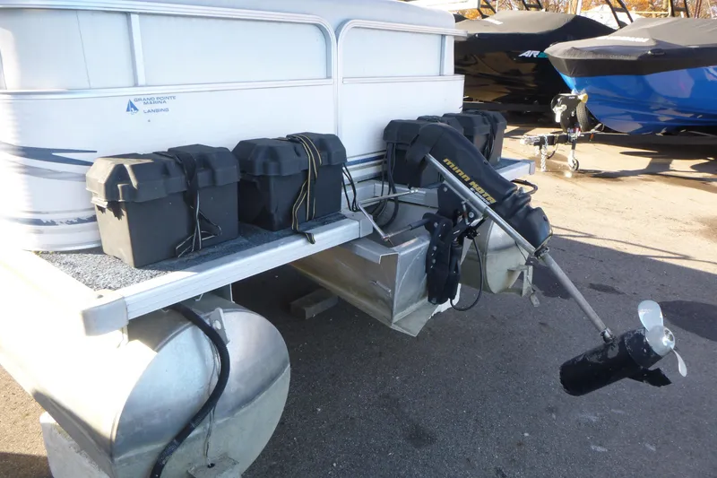 Slide: The Image of 2003 Smoker Craft 816 Infinity Fish pontoon boat with motor and battery boxes. - 7