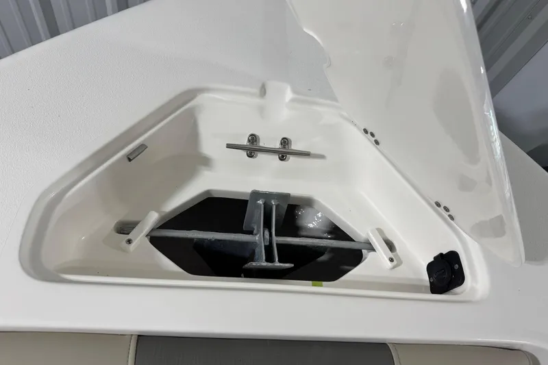 Slide: The Image of Anchor compartment of 2026 Key West 203 DFS boat, open lid view. - 5