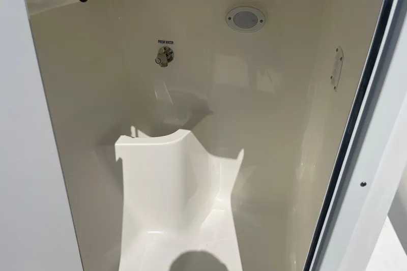 Slide: The Image of Interior of 2026 Key West 203 DFS boat, featuring fresh water access. - 17