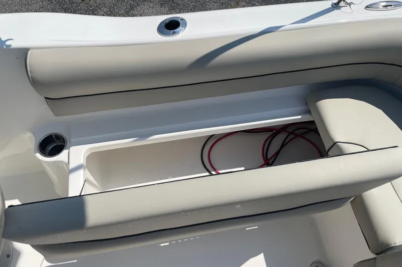 Slide: The Image of Interior seating of 2026 Key West 203 DFS boat with storage compartment. - 4