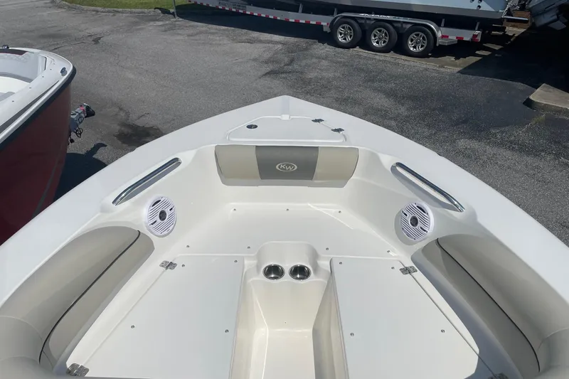 Slide: The Image of 2026 Key West 203 DFS boat interior with seating and speakers. - 7