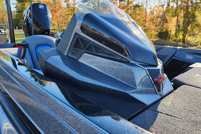 Slide: The Image of 2020 Ranger Z519 boat with sleek design and powerful engine, set against autumn trees. - 10