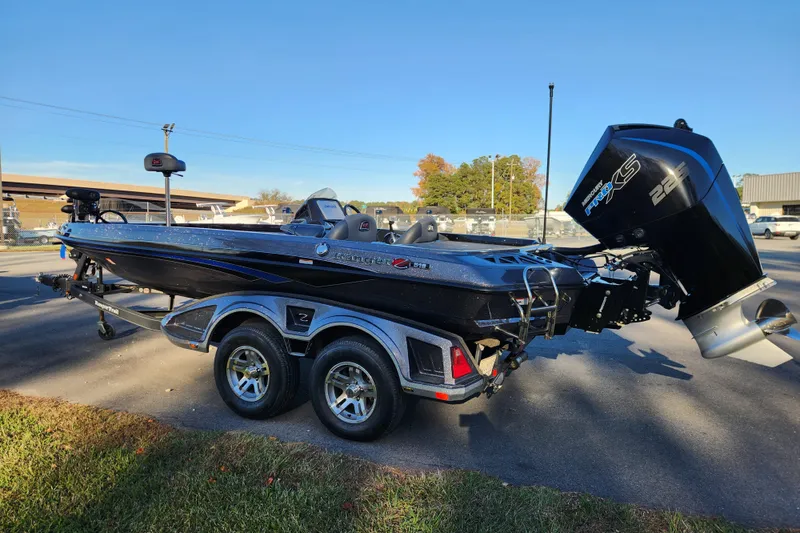 Slide: The Image of 2020 Ranger Z519 boat with trailer, featuring a powerful outboard motor. - 5