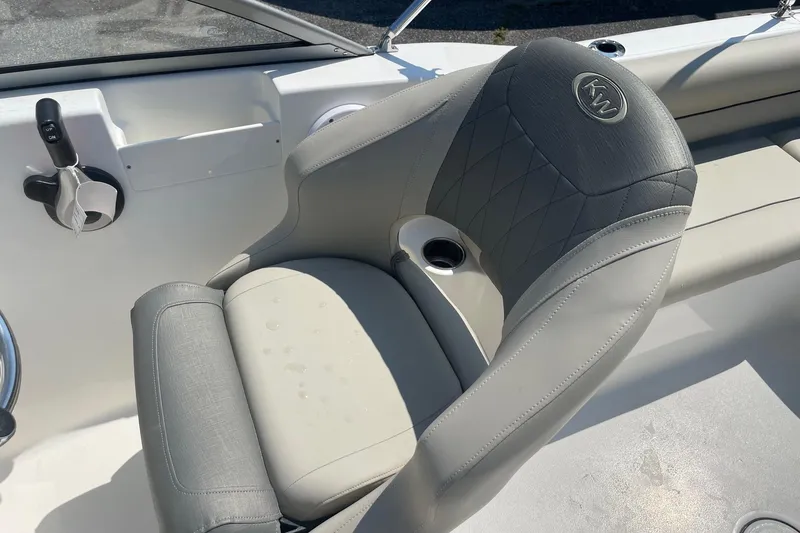 Slide: The Image of 2026 Key West 203 DFS boat seat with cup holder and control panel. - 13