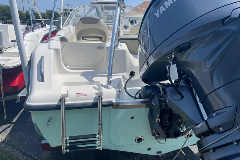Slide: The Image of 2026 Key West 203 DFS boat with Yamaha outboard motor and swim ladder. - 3