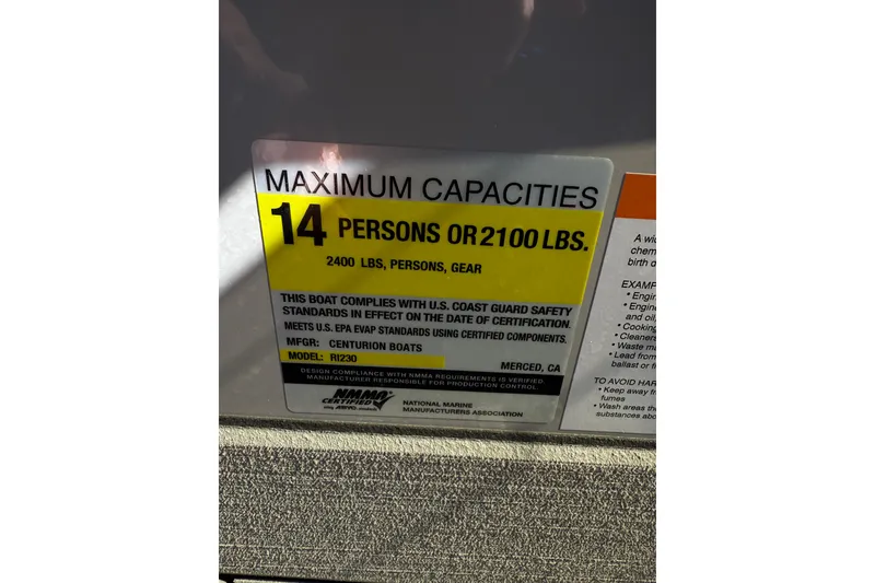 Slide: The Image of 2025 Centurion Ri230 capacity label: 14 persons or 2100 lbs, meets safety standards. - 16