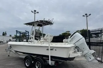 Slide: The Image of 2023 Bulls Bay 2400 boat with Suzuki outboard motor on a trailer. - 4