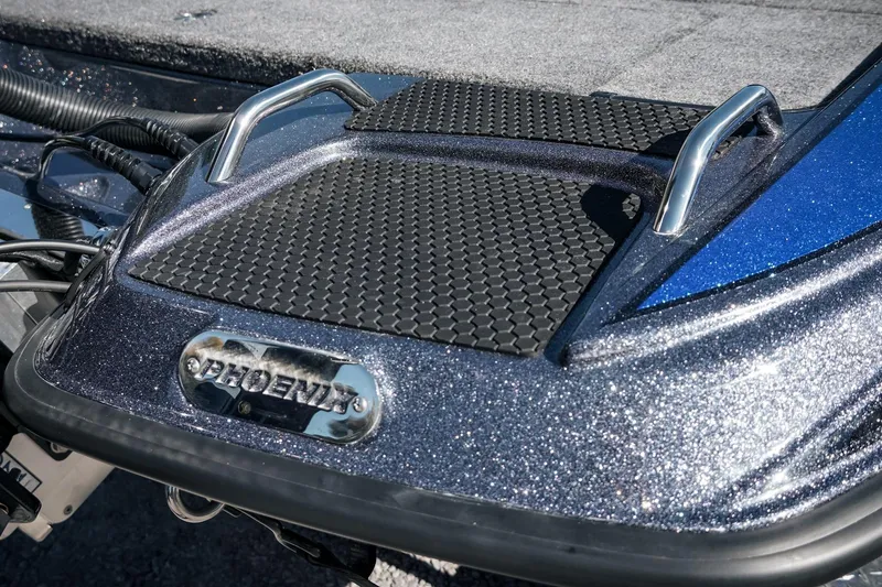 Slide: The Image of 2026 Phoenix 721 ZXL boat deck with metallic finish and textured grip pads. - 14